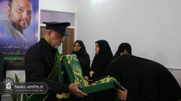 ادای احترام خادمان حرم حضرت فاطمه معصومه (س) به خانواده شهید اسدی